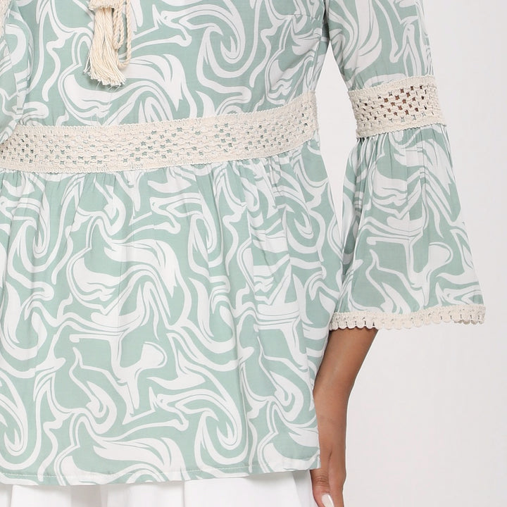 Printed blouse with flared sleeves